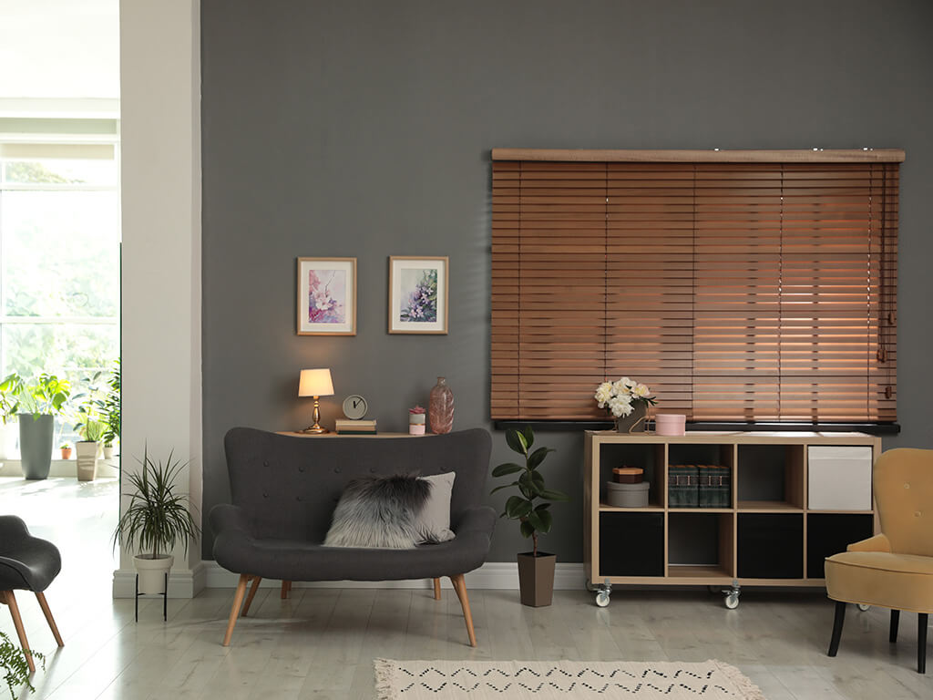 Modern style living room with closed bamboo blinds